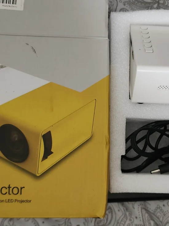 Compact White and Yellow Mini Projector with Remote - Picture 3 of 5